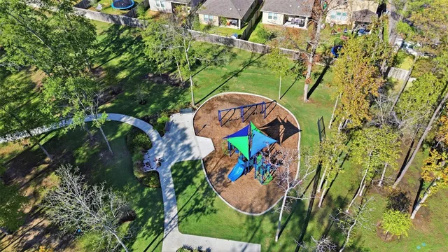 an aerial view of residential house with outdoor space and swimming pool