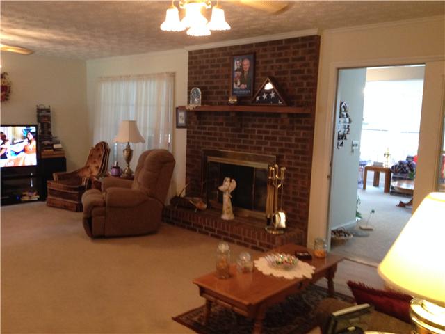 516 Locust Grove Road Watertown, TN 37184 - Photo 14 of 20 Living room, brick surround gas fireplace.