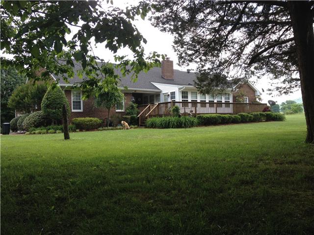 516 Locust Grove Road Watertown, TN 37184 - Photo 3 of 20 Rear view, large deck, huge sunroom, covered porch area