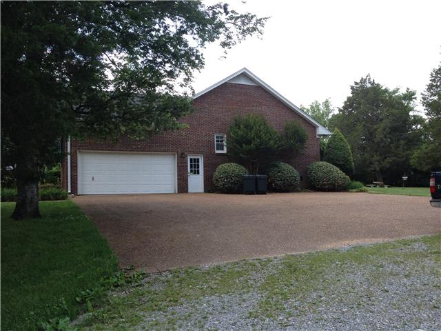 516 Locust Grove Road Watertown, TN 37184 - Photo 5 of 20 Garage side of home, aggergiate concrete turnaround.