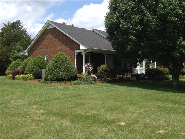 516 Locust Grove Road Watertown, TN 37184 - Photo 6 of 20 Side view of house, part of front covered porch.