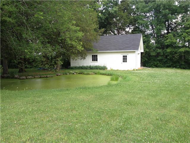 516 Locust Grove Road Watertown, TN 37184 - Photo 8 of 20 view of 20x30 detached garage and small pond.