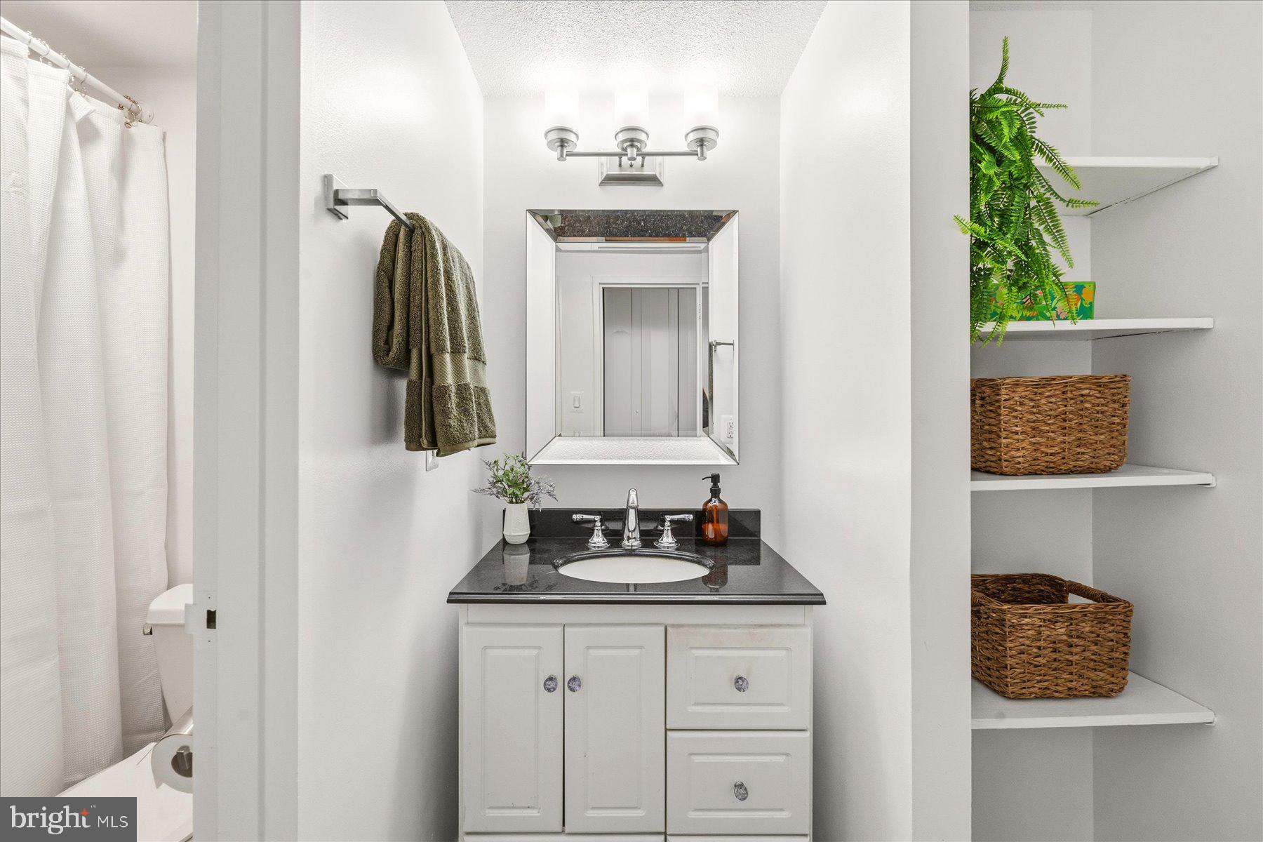 1718 P Street Northwest, Unit 507 Washington, DC 20036 - Photo 12 of 15 Updated full bathroom with lots of storage!