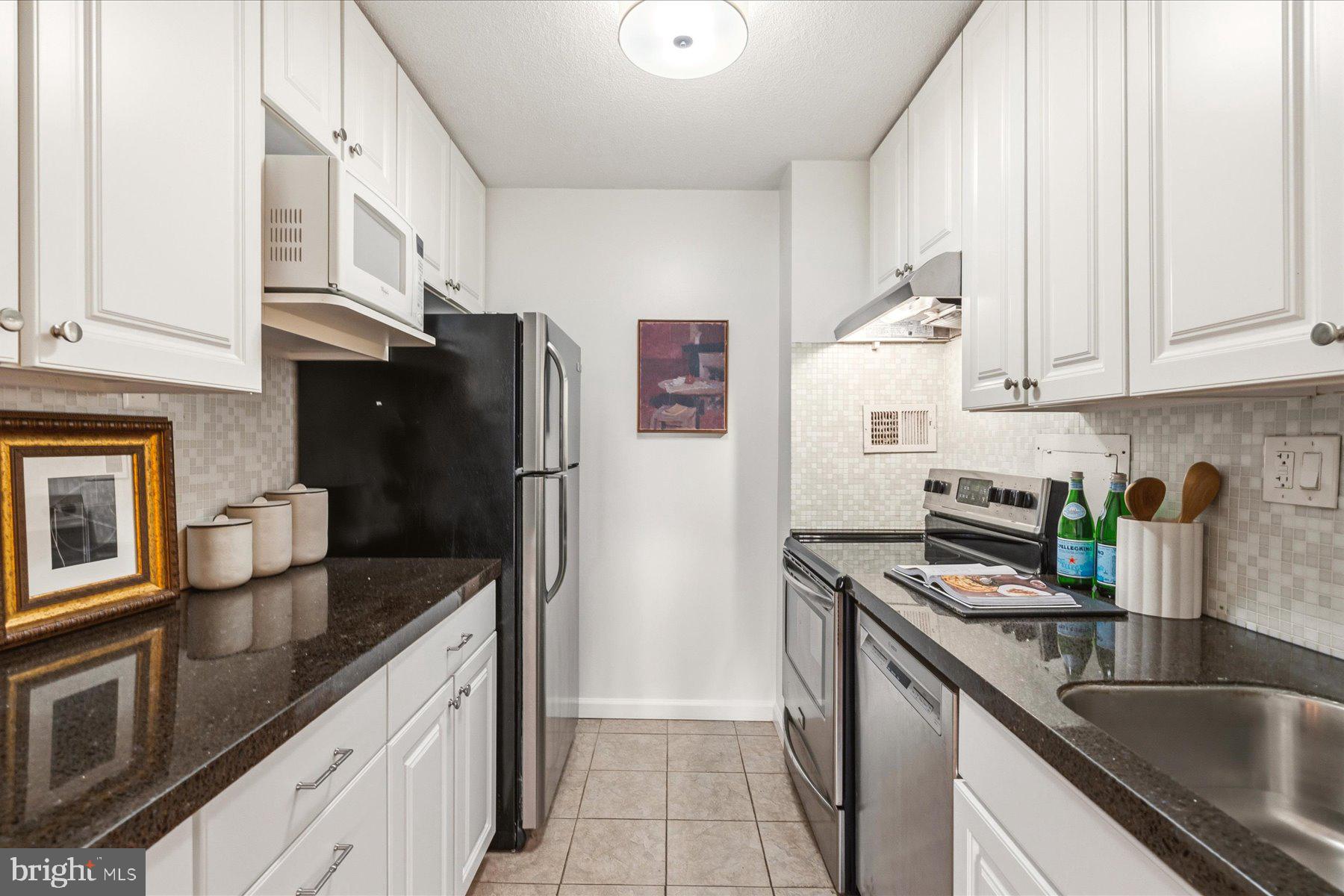1718 P Street Northwest, Unit 507 Washington, DC 20036 - Photo 7 of 15 Updated galley kitchen