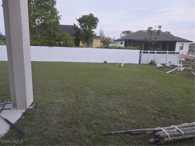 a view of outdoor space and yard