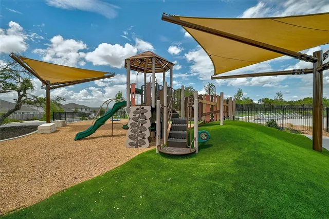 a view of a park with slide