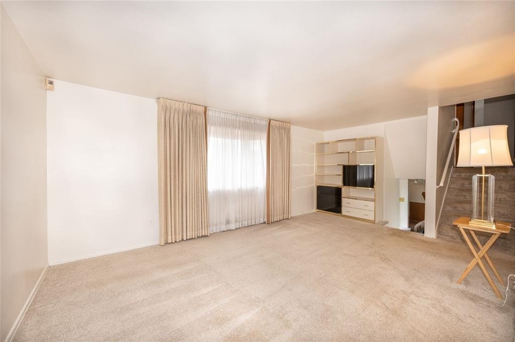 1342 Cathell Road Pittsburgh, PA 15236 - Photo 12 of 31 a view of a livingroom with a staircase