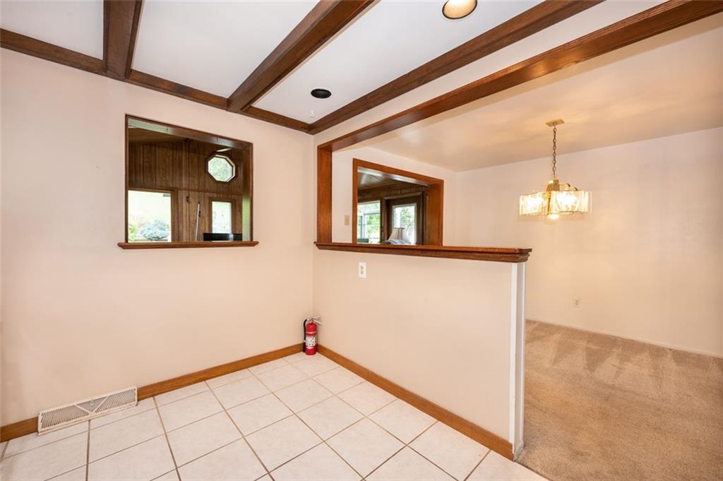 1342 Cathell Road Pittsburgh, PA 15236 - Photo 13 of 31 a view of a room that has a window and wooden floor