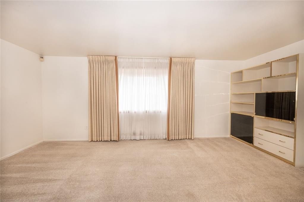 1342 Cathell Road Pittsburgh, PA 15236 - Photo 14 of 31 a view of an empty room with a window