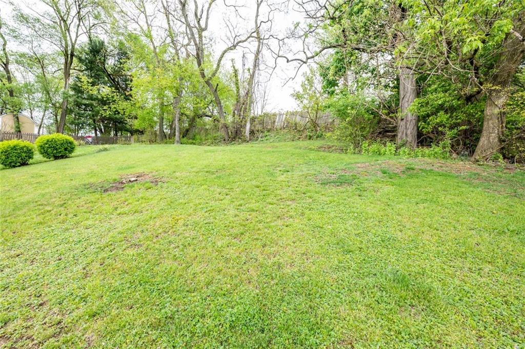 1342 Cathell Road Pittsburgh, PA 15236 - Photo 22 of 31 a backyard of a house with large trees