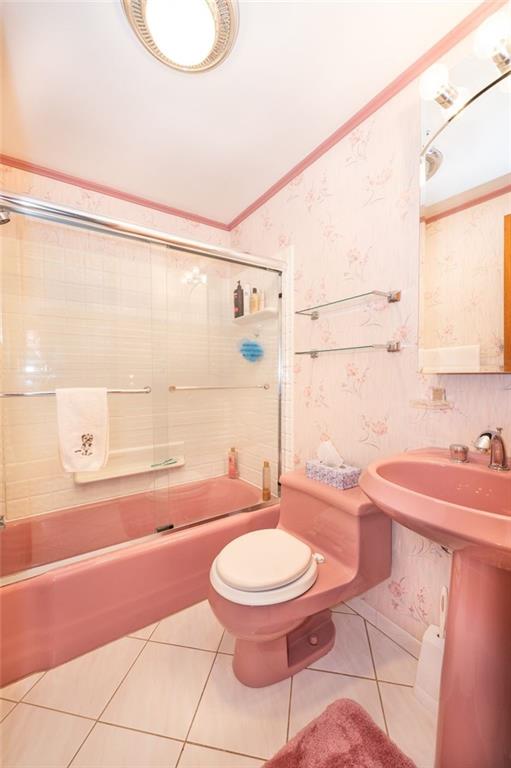 1342 Cathell Road Pittsburgh, PA 15236 - Photo 29 of 31 a bathroom with a granite countertop sink toilet a mirror and shower