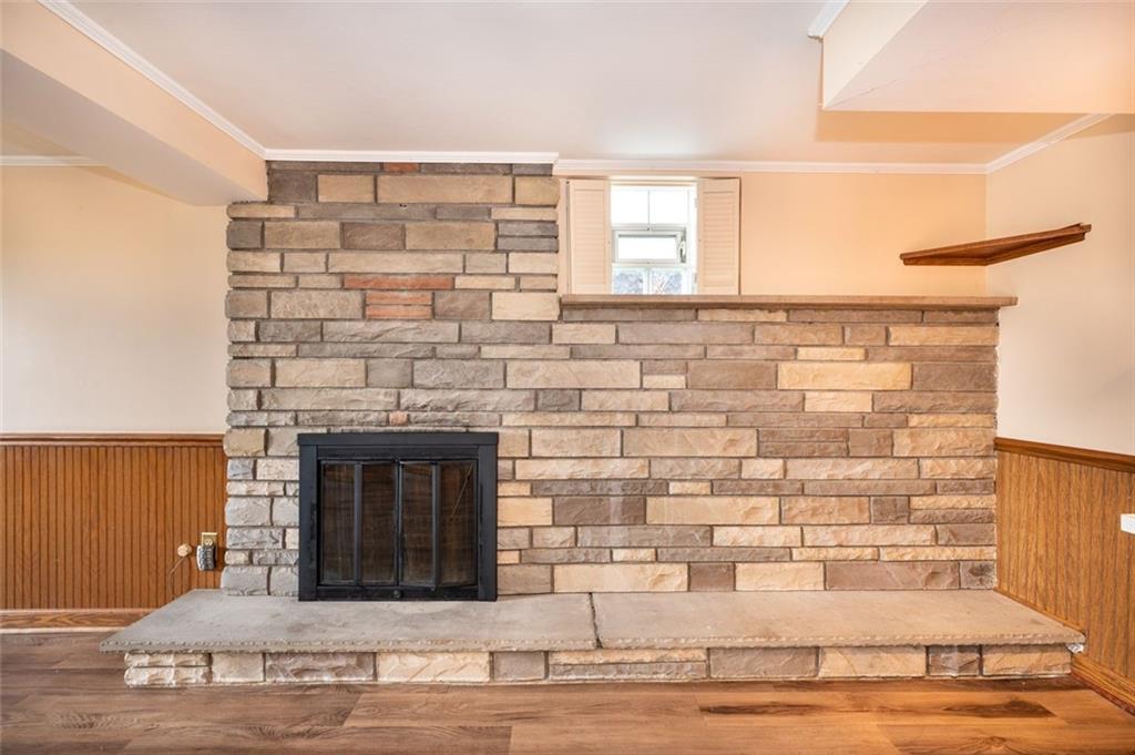 1342 Cathell Road Pittsburgh, PA 15236 - Photo 8 of 31 a view of a fireplace with wooden floor