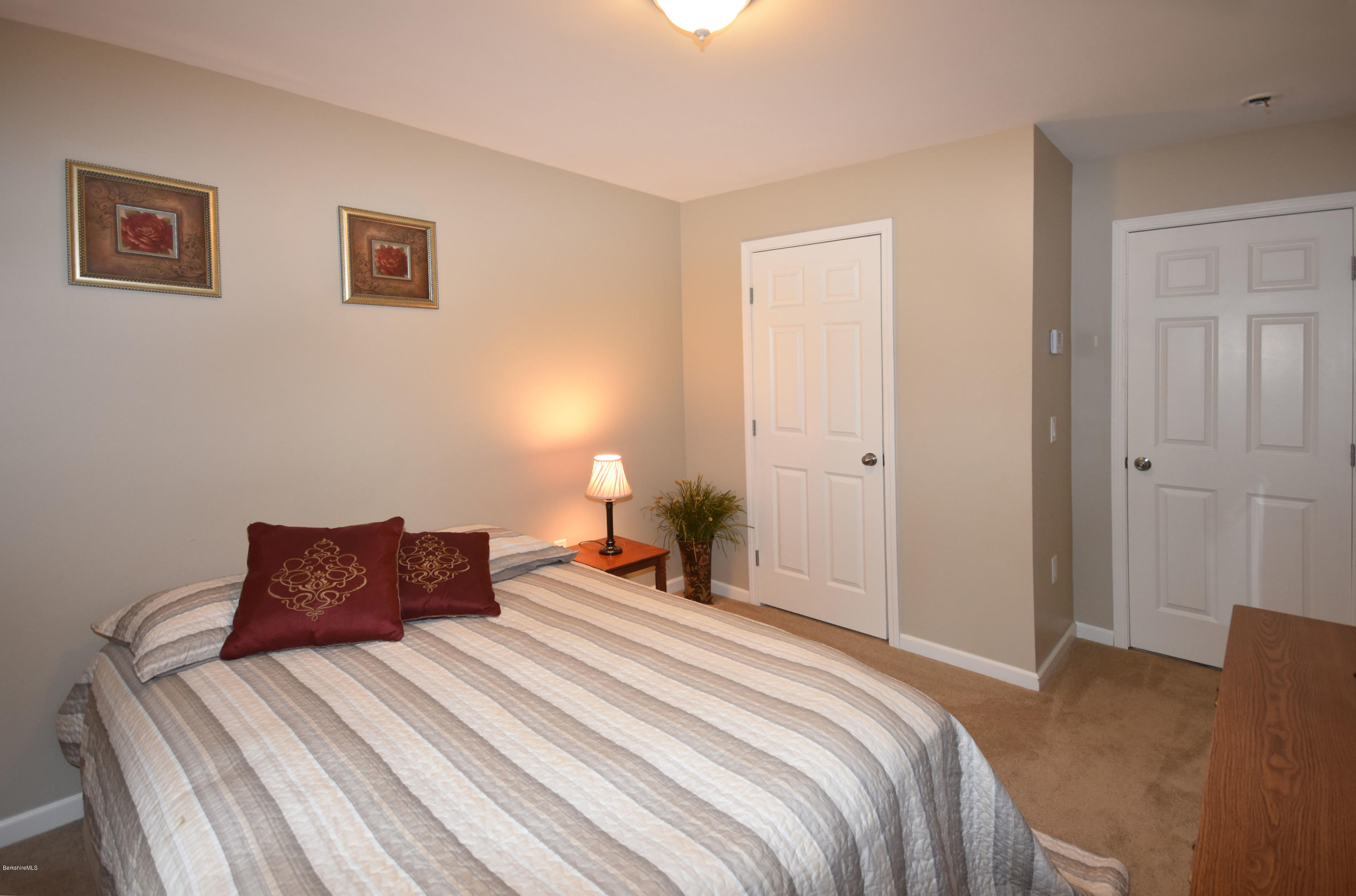 205 Windsor Road Savoy, MA 01256 - Photo 29 of 53 a bedroom with a bed and a night lamp