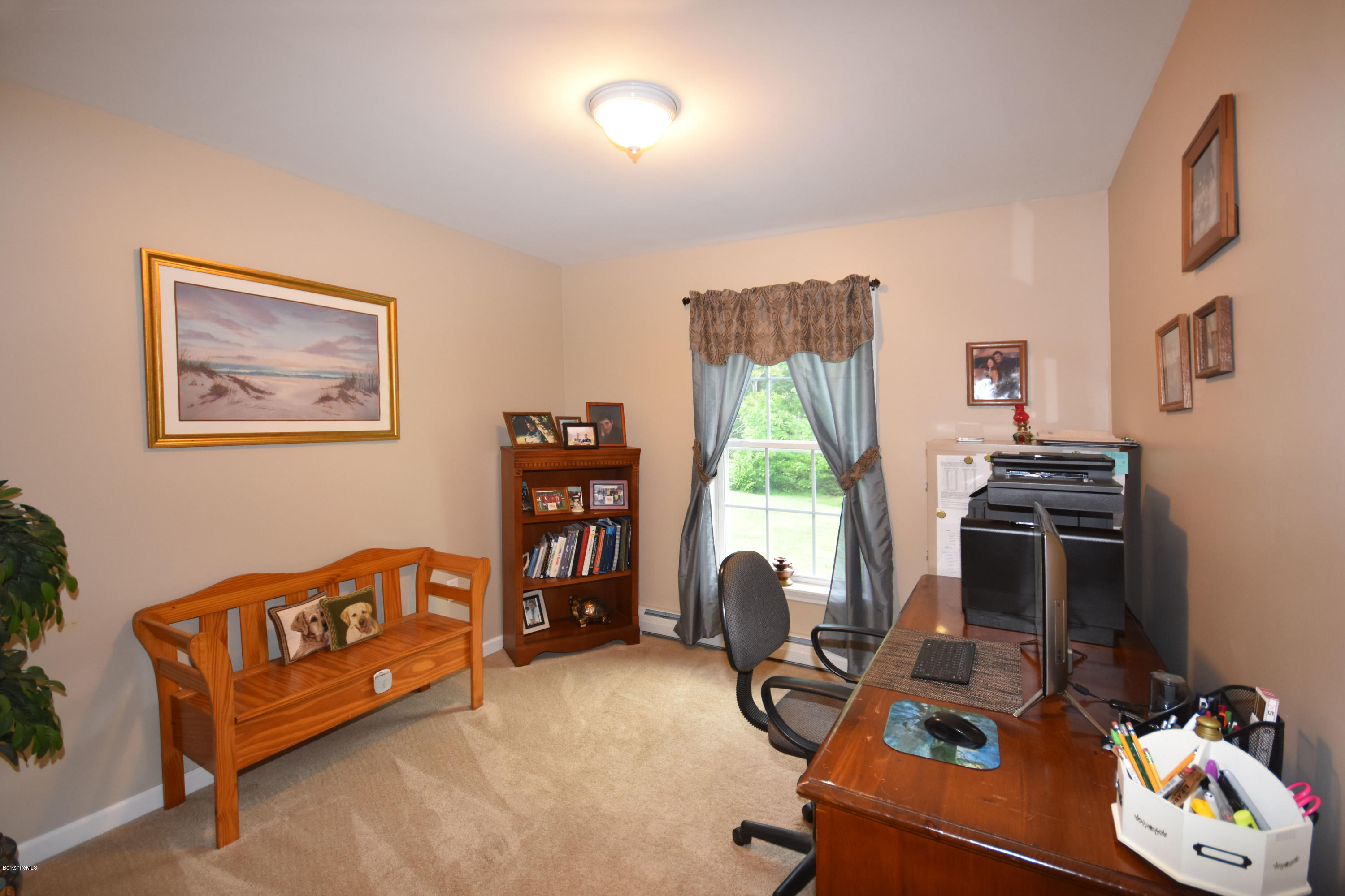 205 Windsor Road Savoy, MA 01256 - Photo 31 of 53 a view of a workspace with furniture and a window