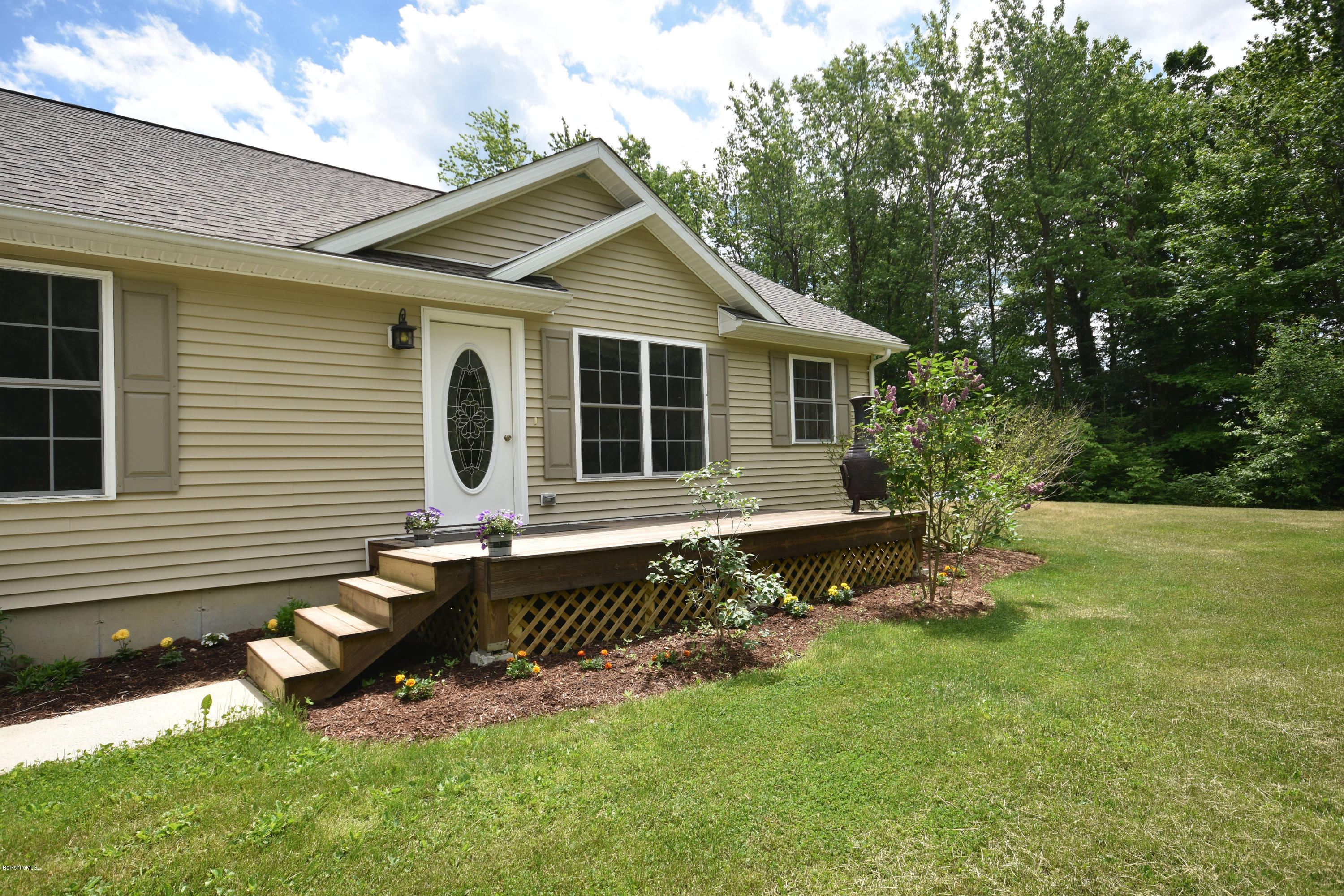 205 Windsor Road Savoy, MA 01256 - Photo 5 of 53 a front view of a house with a yard
