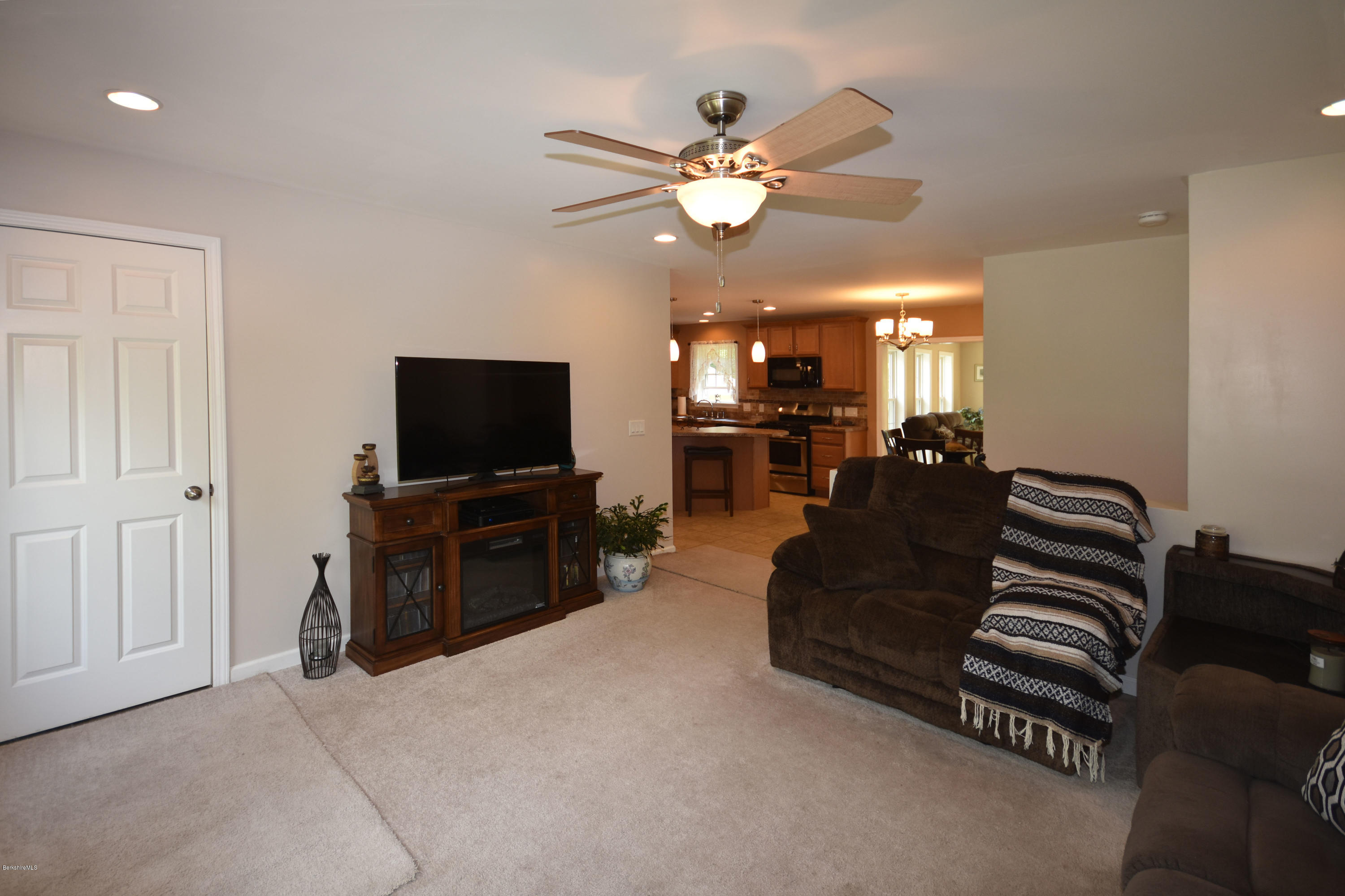 205 Windsor Road Savoy, MA 01256 - Photo 8 of 53 a living room with furniture and a flat screen tv