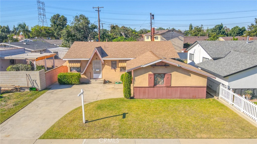 15719 Pitts Avenue Paramount, CA 90723 - Photo 1 of 33 a aerial view of a house with a yard