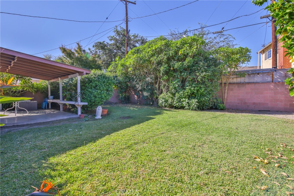 15719 Pitts Avenue Paramount, CA 90723 - Photo 28 of 33 a view of a backyard with sitting area