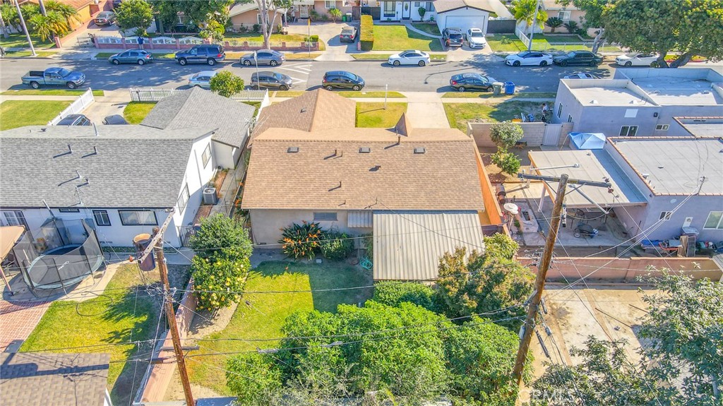 15719 Pitts Avenue Paramount, CA 90723 - Photo 5 of 33 an aerial view of a house with a swimming pool