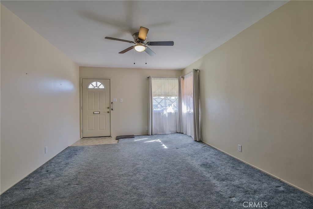15719 Pitts Avenue Paramount, CA 90723 - Photo 8 of 33 a view of an empty room with a window