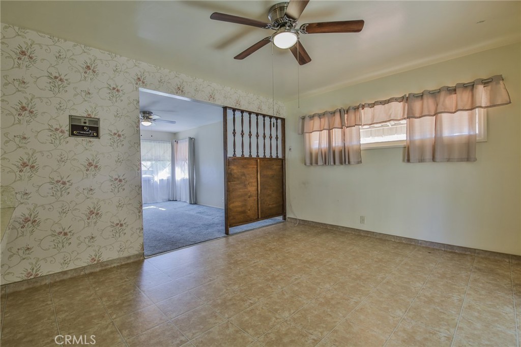 15719 Pitts Avenue Paramount, CA 90723 - Photo 10 of 33 wooden floor in an empty room