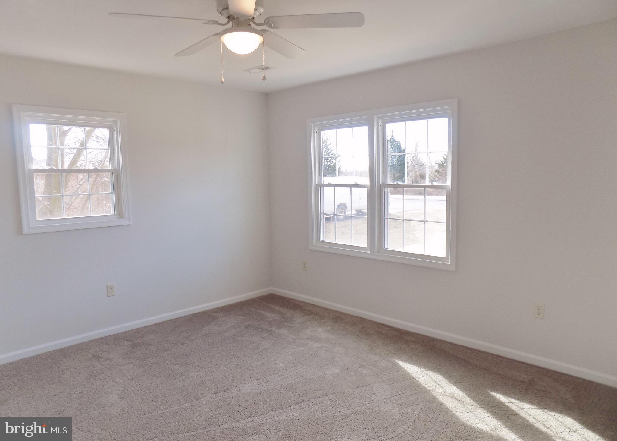 592 Apple Valley Road Winchester, VA 22602 - Photo 21 of 30 Two of three bedrooms.