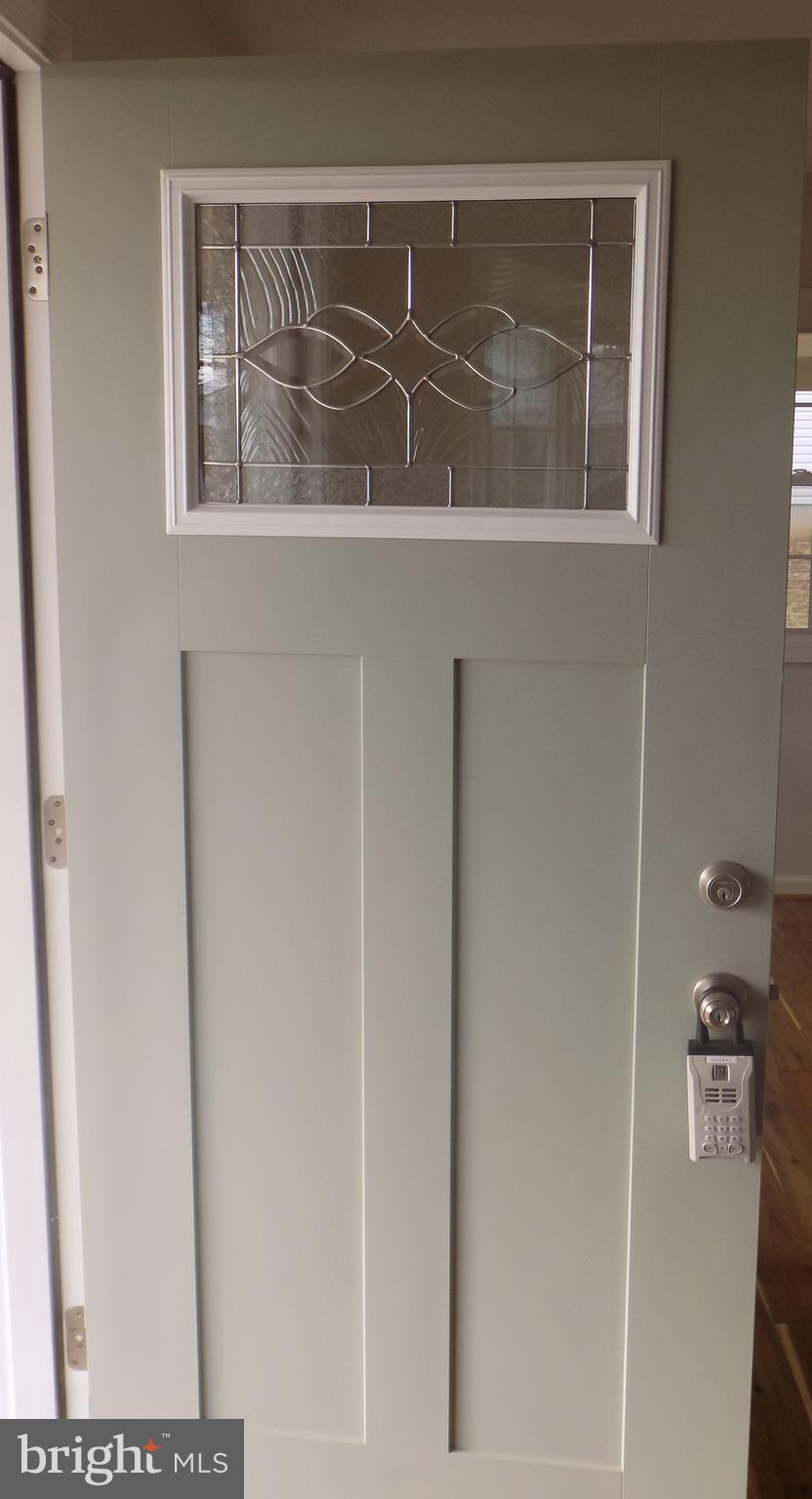 592 Apple Valley Road Winchester, VA 22602 - Photo 6 of 30 Custom front door with inlaid designed glass....