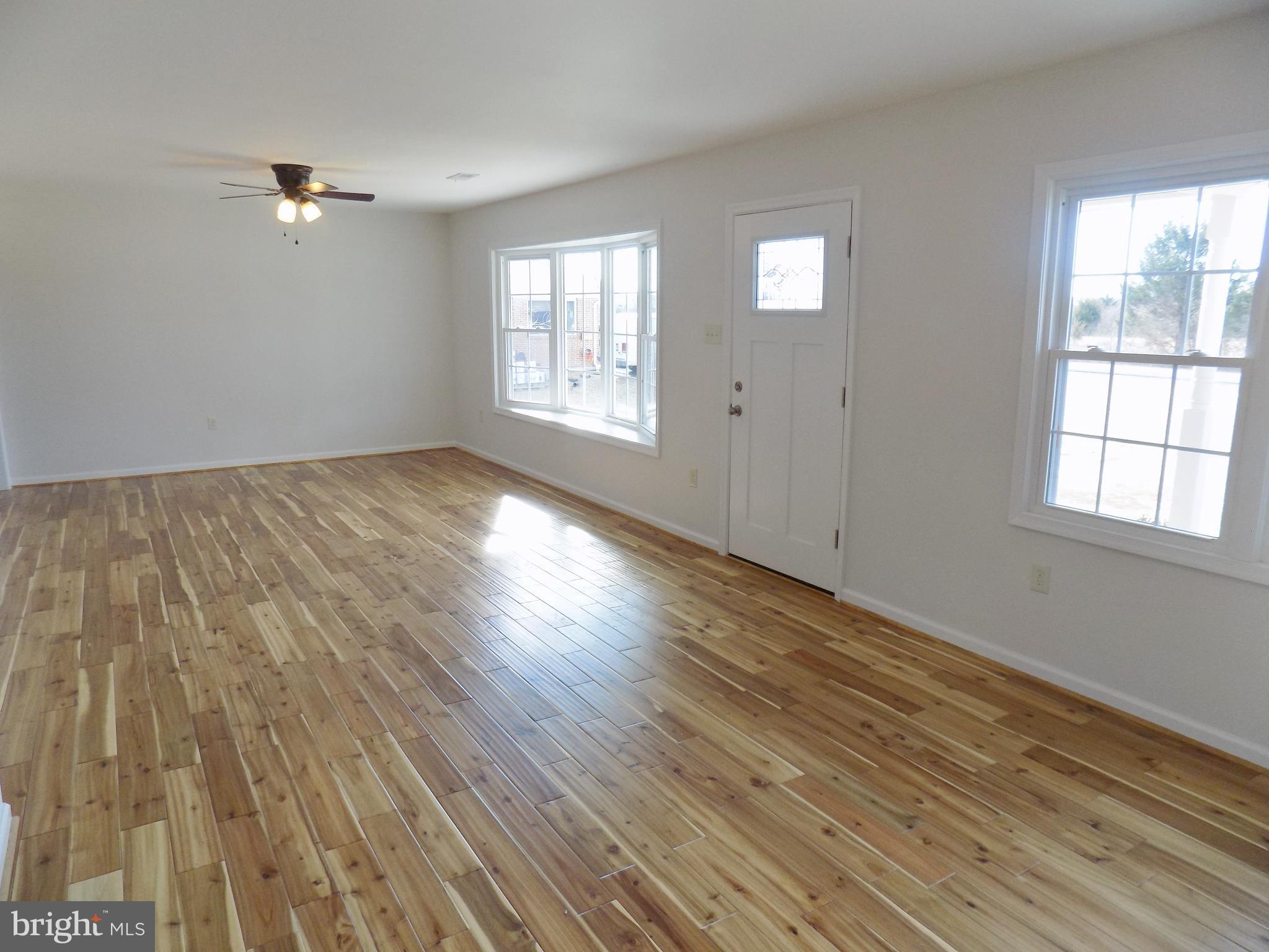 592 Apple Valley Road Winchester, VA 22602 - Photo 7 of 30 The living room is truly HUGE w/ New wood floors..