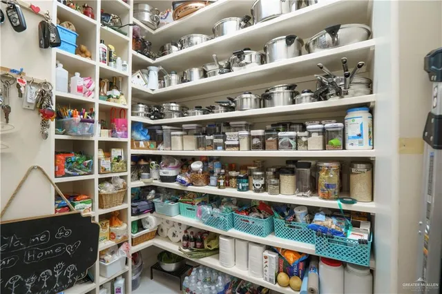 a room with books and a book shelf