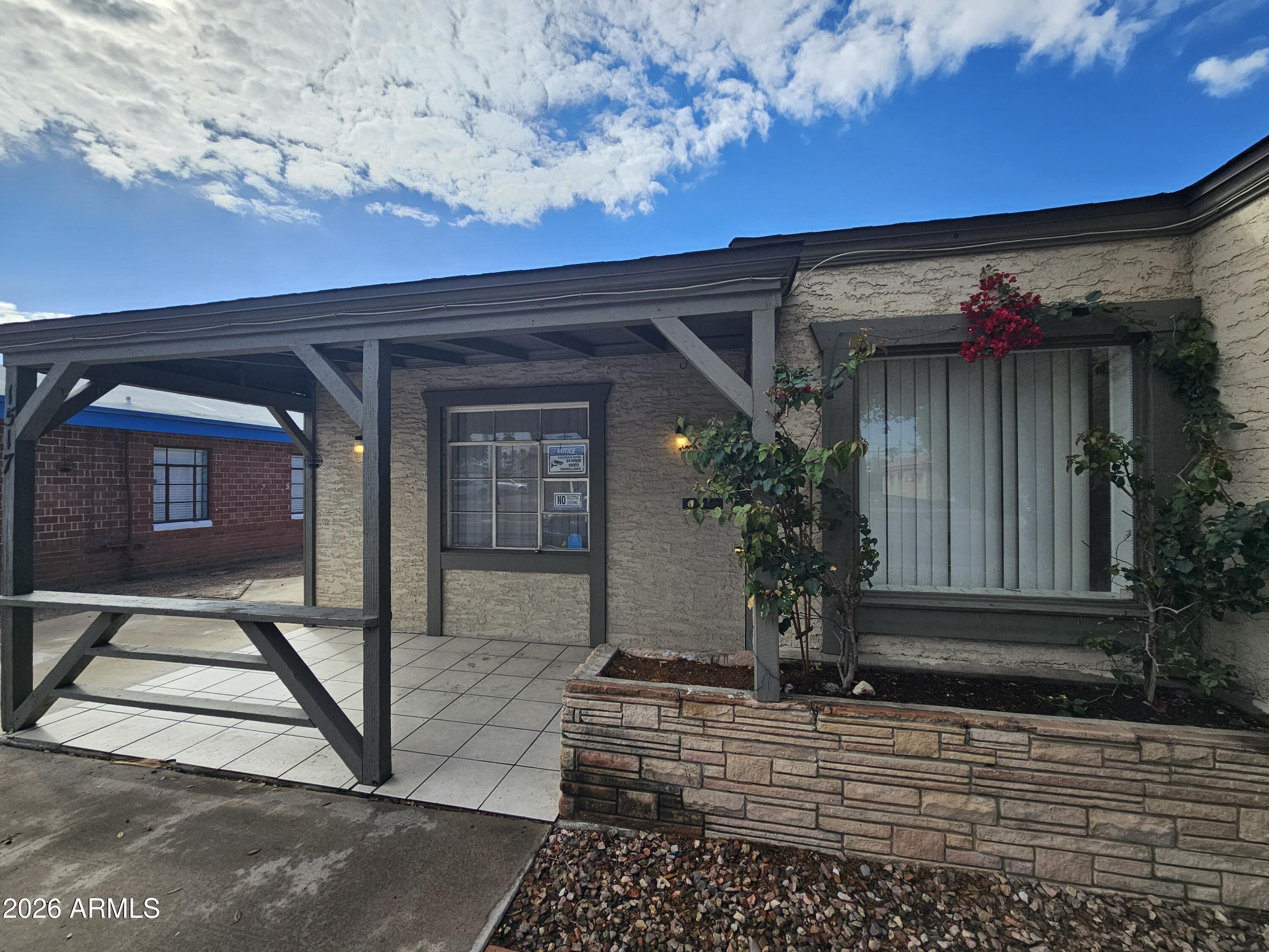 1517 West Thomas Road, Unit 3 Phoenix, AZ 85015 - Photo 1 of 14 a view of house with entryway