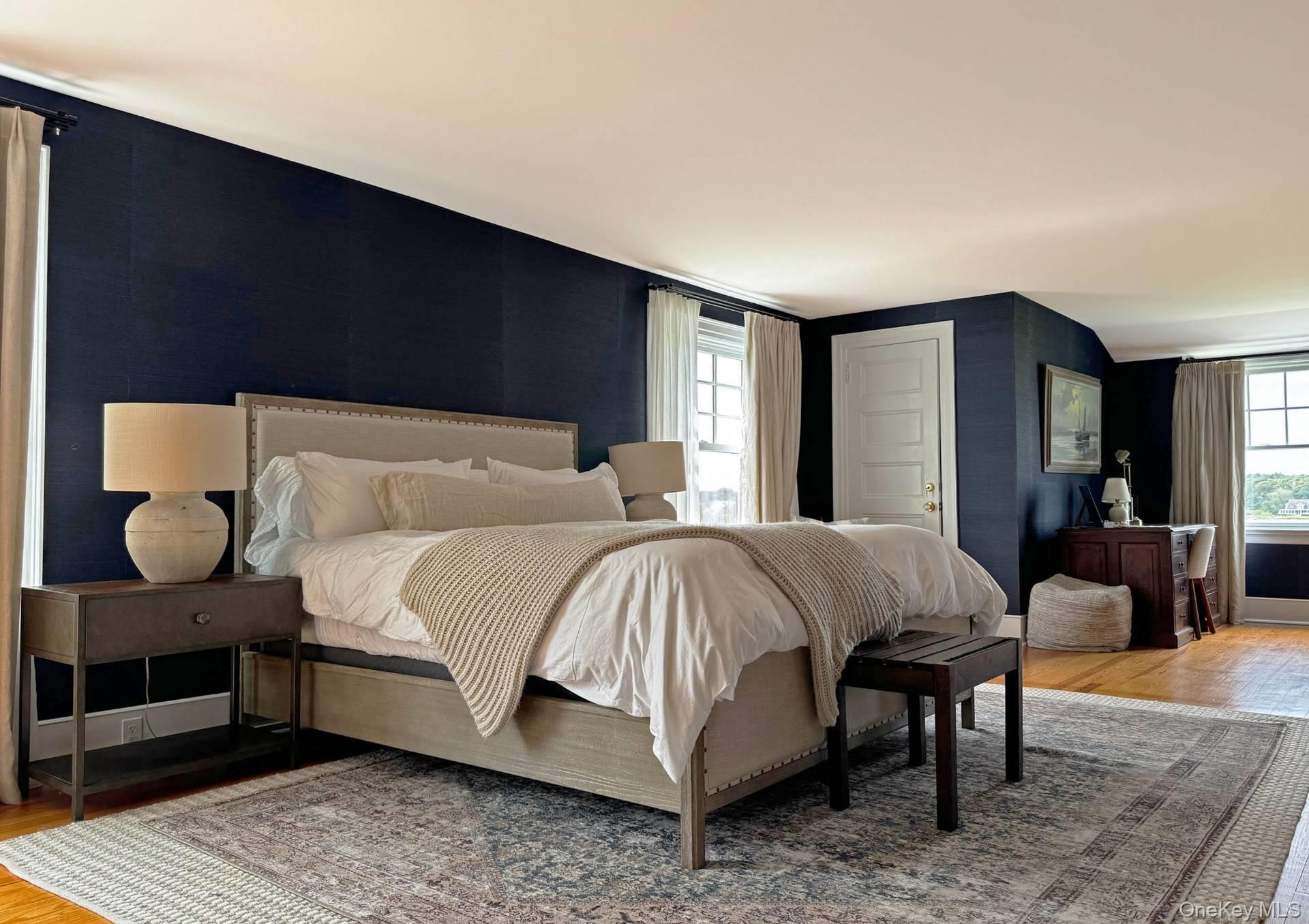 4 Sandacres Road Quogue, NY 11959 - Photo 29 of 32 a bed room with a bed and chair