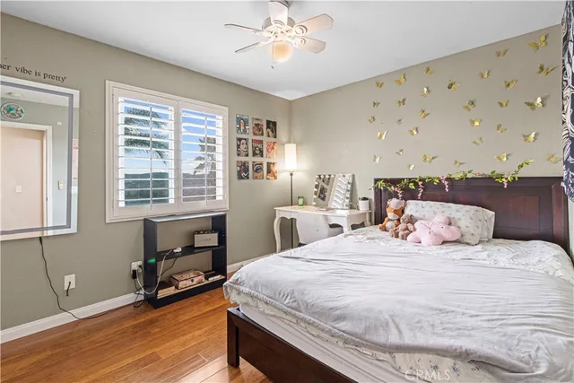 a bedroom with a bed and a table