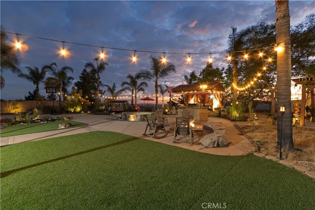 a view of a chairs and table in the patio