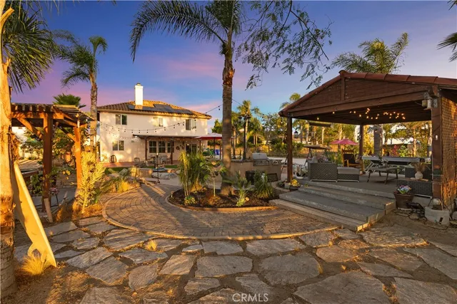 a view of swimming pool with outdoor seating