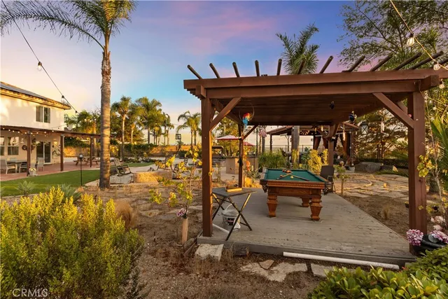 a view of a house with a yard and garage