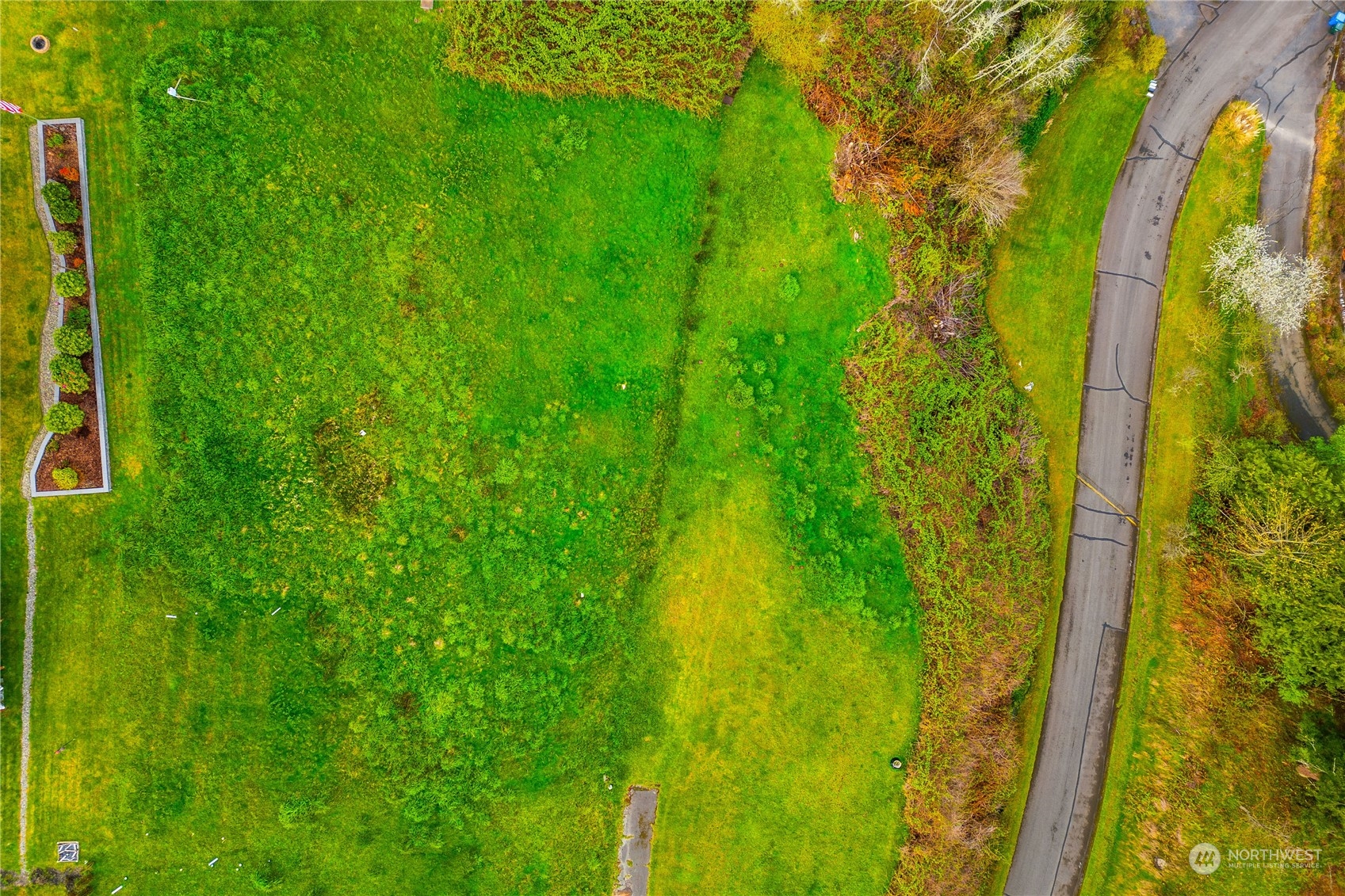 9214 163rd Avenue Southwest Longbranch, WA 98351 - Photo 11 of 31 a view of a garden