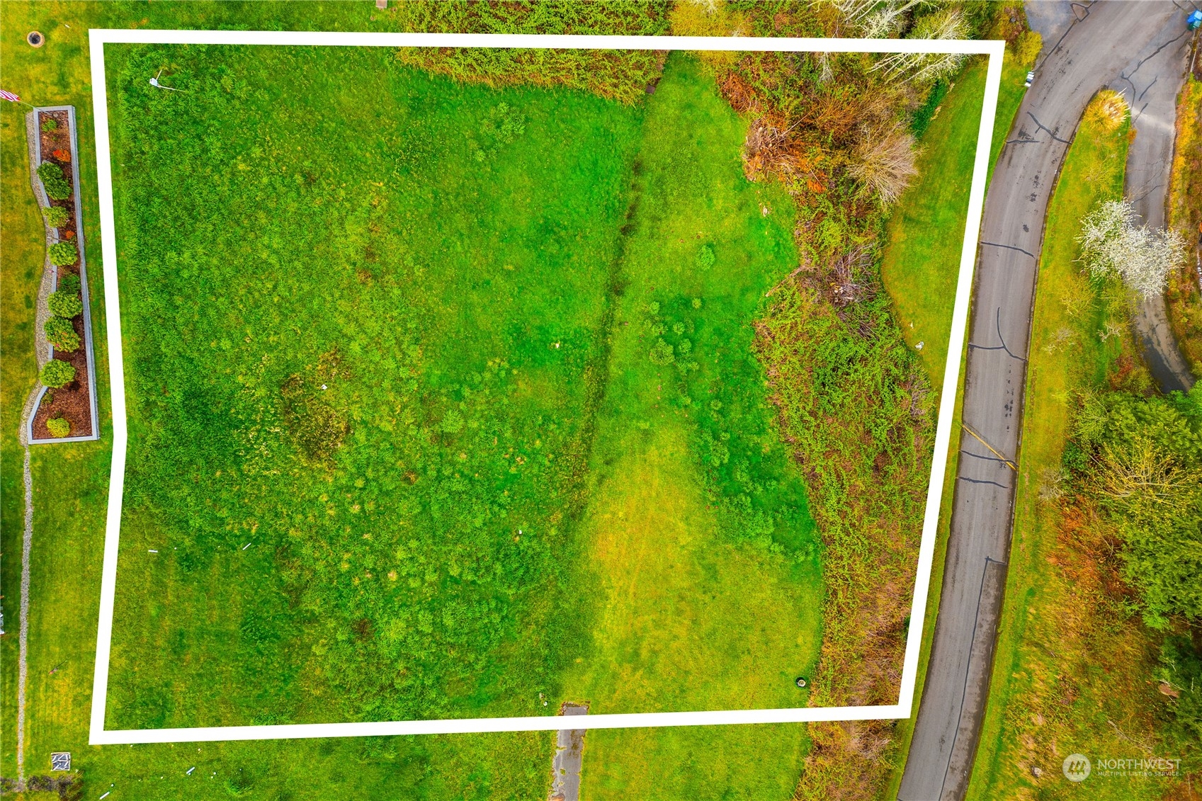 9214 163rd Avenue Southwest Longbranch, WA 98351 - Photo 12 of 31 a view of a garden