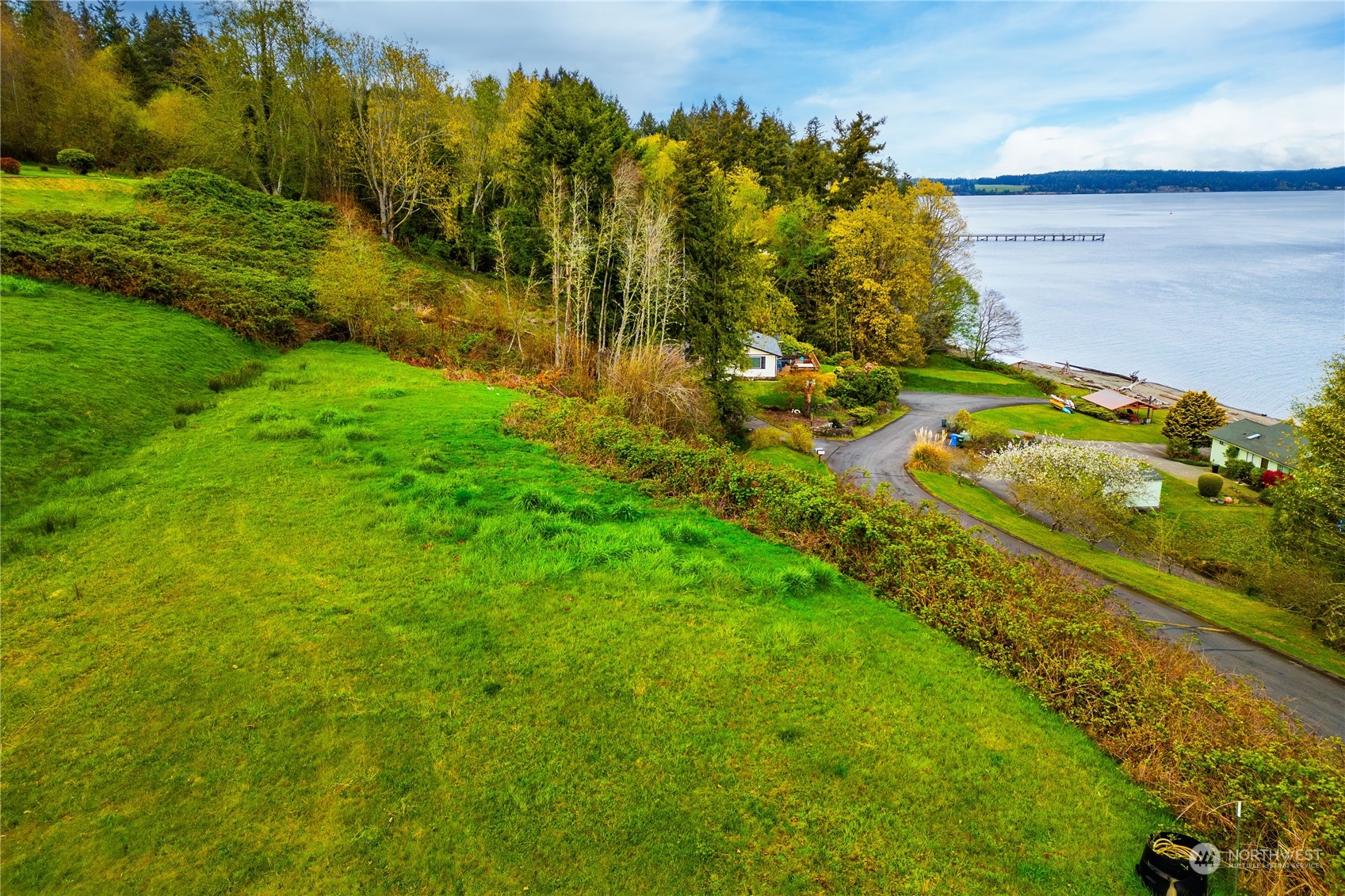 9214 163rd Avenue Southwest Longbranch, WA 98351 - Photo 13 of 31 a view of a yard with of trees