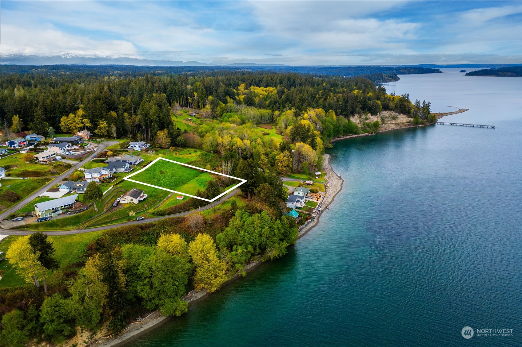 9214 163rd Avenue Southwest Longbranch, WA 98351 - Photo 20 of 31 a view of a lake with a mountain