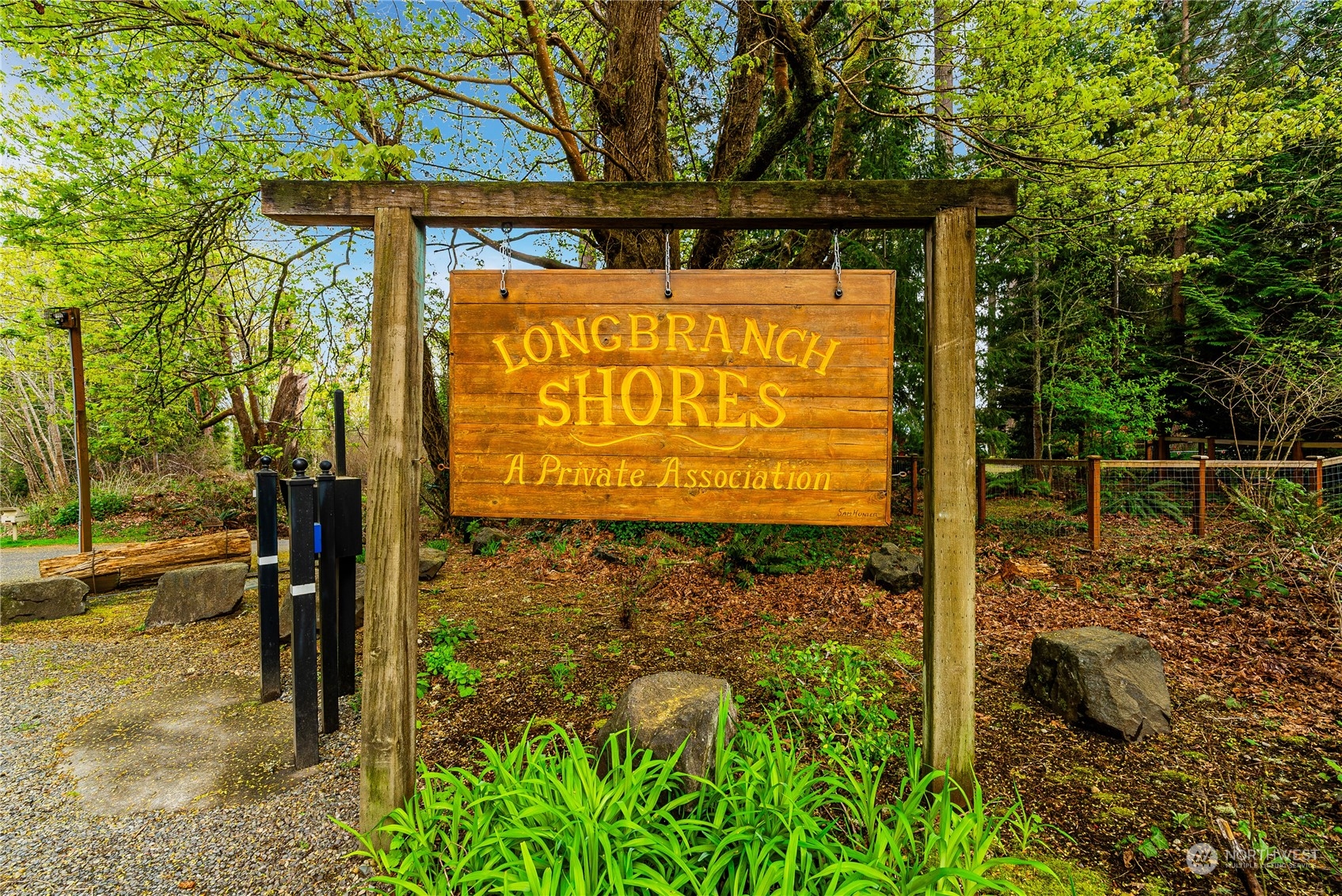 9214 163rd Avenue Southwest Longbranch, WA 98351 - Photo 31 of 31 a sign on the side of the road