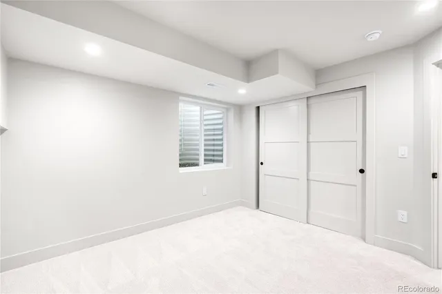 a big room with windows and closet