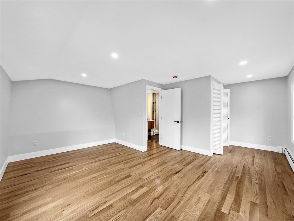 21 Burlington Road Billerica, MA 01821 - Photo 29 of 42 a view of an empty room with wooden floor
