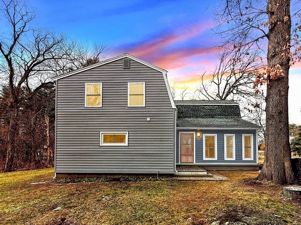 21 Burlington Road Billerica, MA 01821 - Photo 3 of 42 a front view of a house with a yard