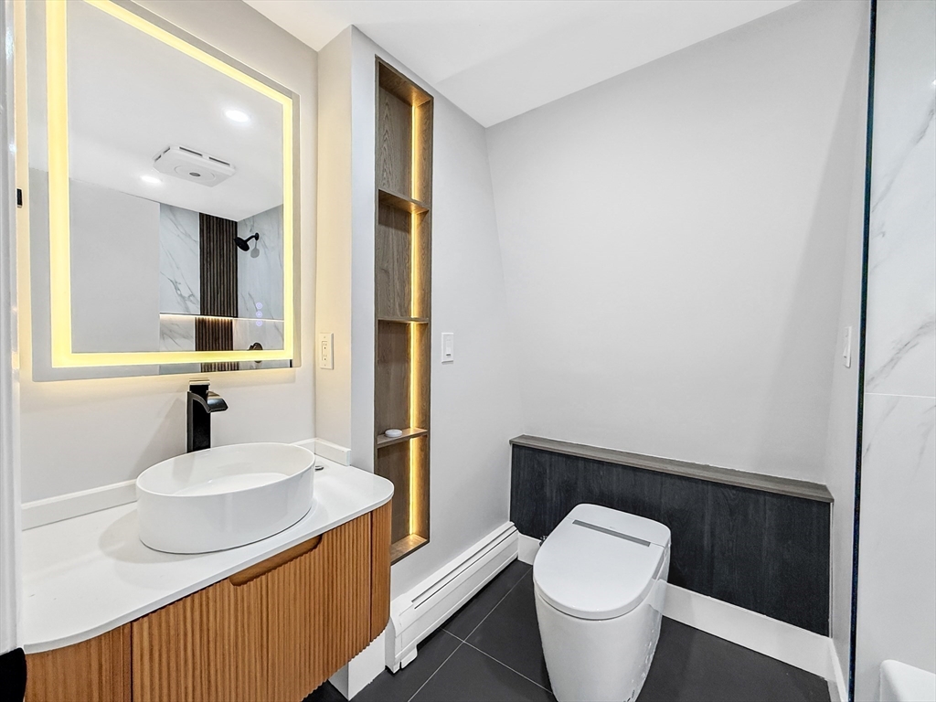 21 Burlington Road Billerica, MA 01821 - Photo 31 of 42 a bathroom with a sink and a toilet