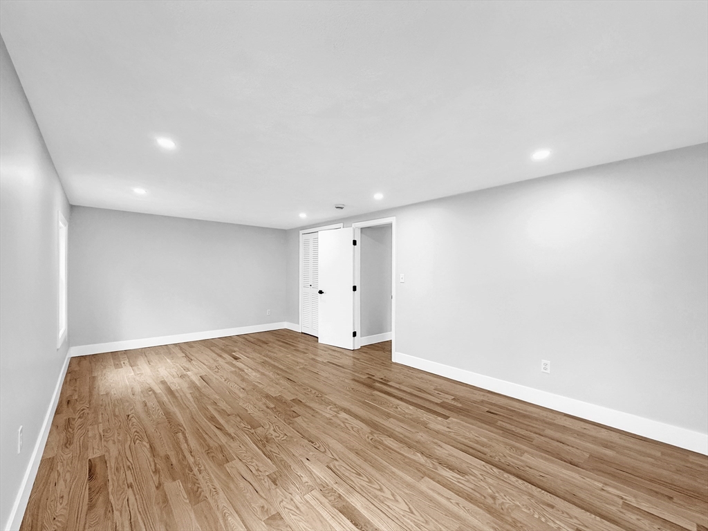 21 Burlington Road Billerica, MA 01821 - Photo 34 of 42 a view of an empty room with wooden floor