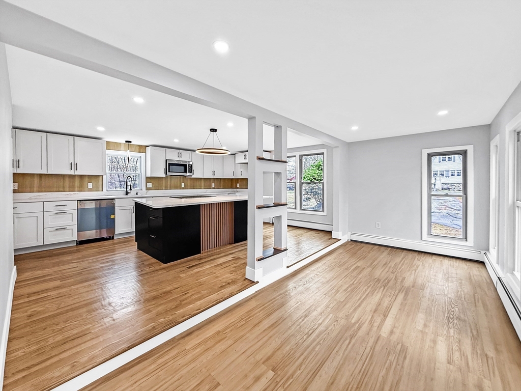 21 Burlington Road Billerica, MA 01821 - Photo 4 of 42 a view of kitchen with sink microwave and stove