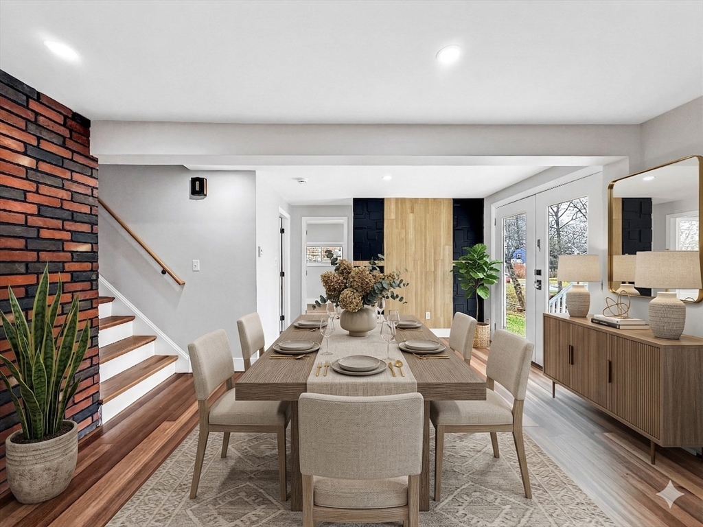 21 Burlington Road Billerica, MA 01821 - Photo 7 of 42 a view of a dining room with furniture and wooden floor