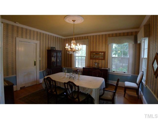 317 Dixie Trail, Unit 2 Raleigh, NC 27607 - Photo 7 of 25 a kitchen with a table and chairs