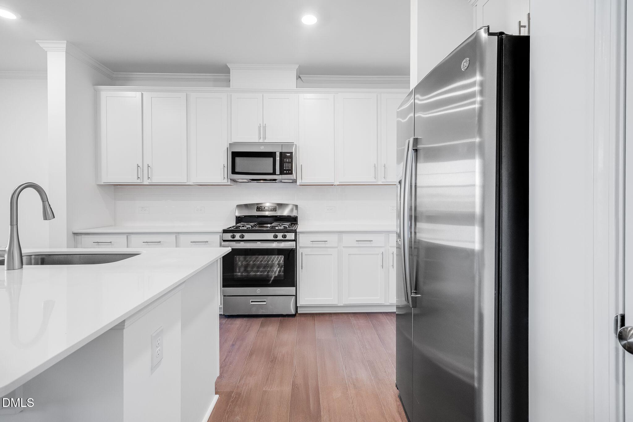 2943 Hickory Fld Drive Raleigh, NC 27616 - Photo 9 of 30 SUN_Everlee_Pic_CarsonII_QMI_239_Kitchen