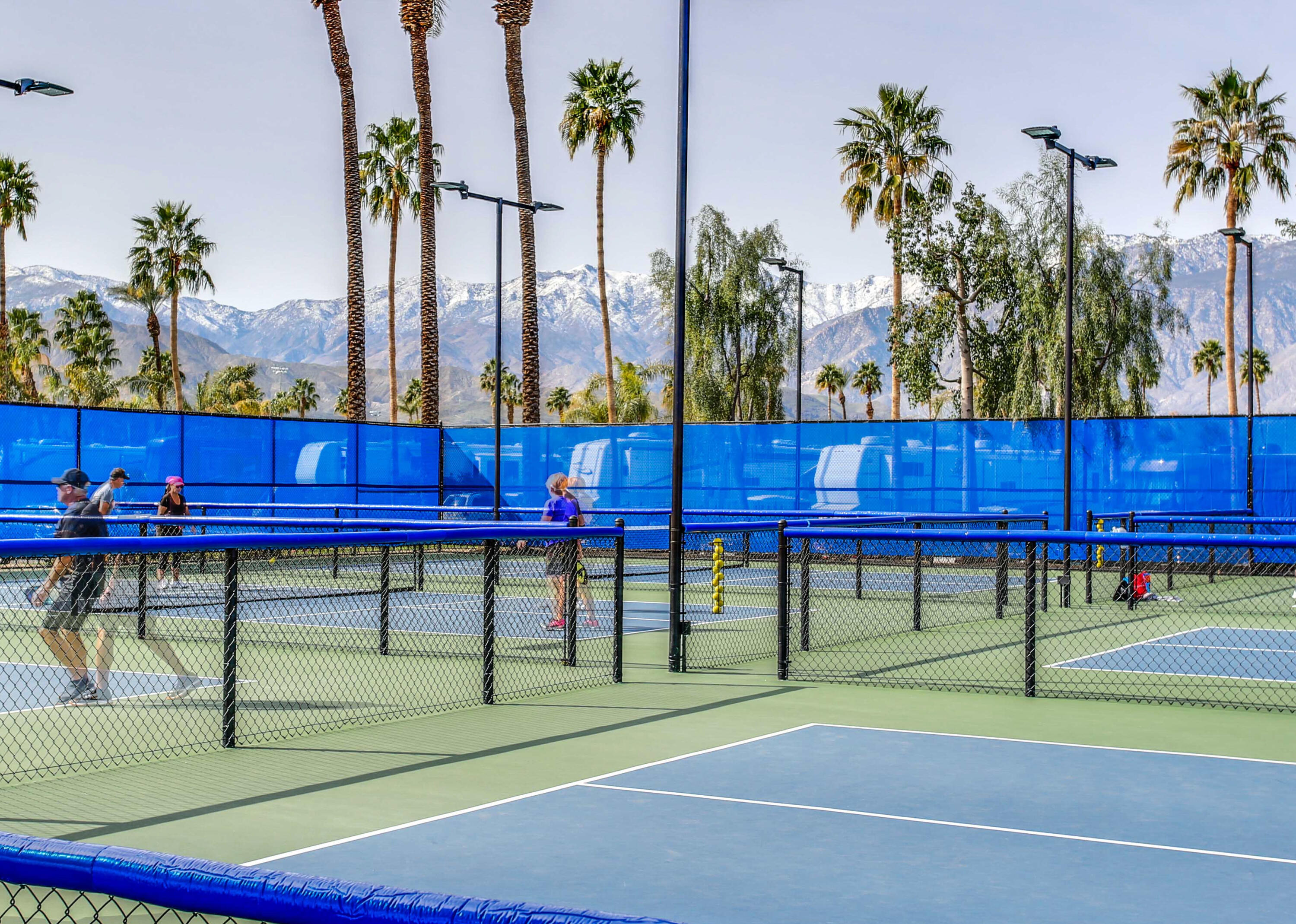 69411 Ramon Road, Unit 304 Cathedral City, CA 92234 - Photo 40 of 55 a view of lawn chairs and table in the patio